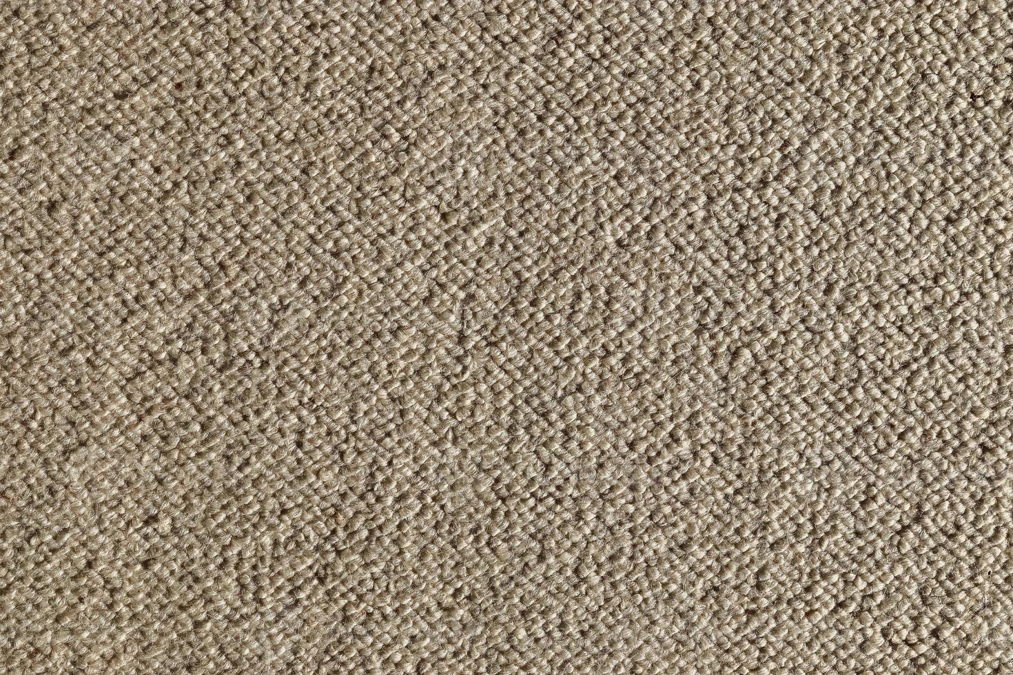 Detailed close up view on samples of cloth and fabrics in different colors found at a fabrics market photo