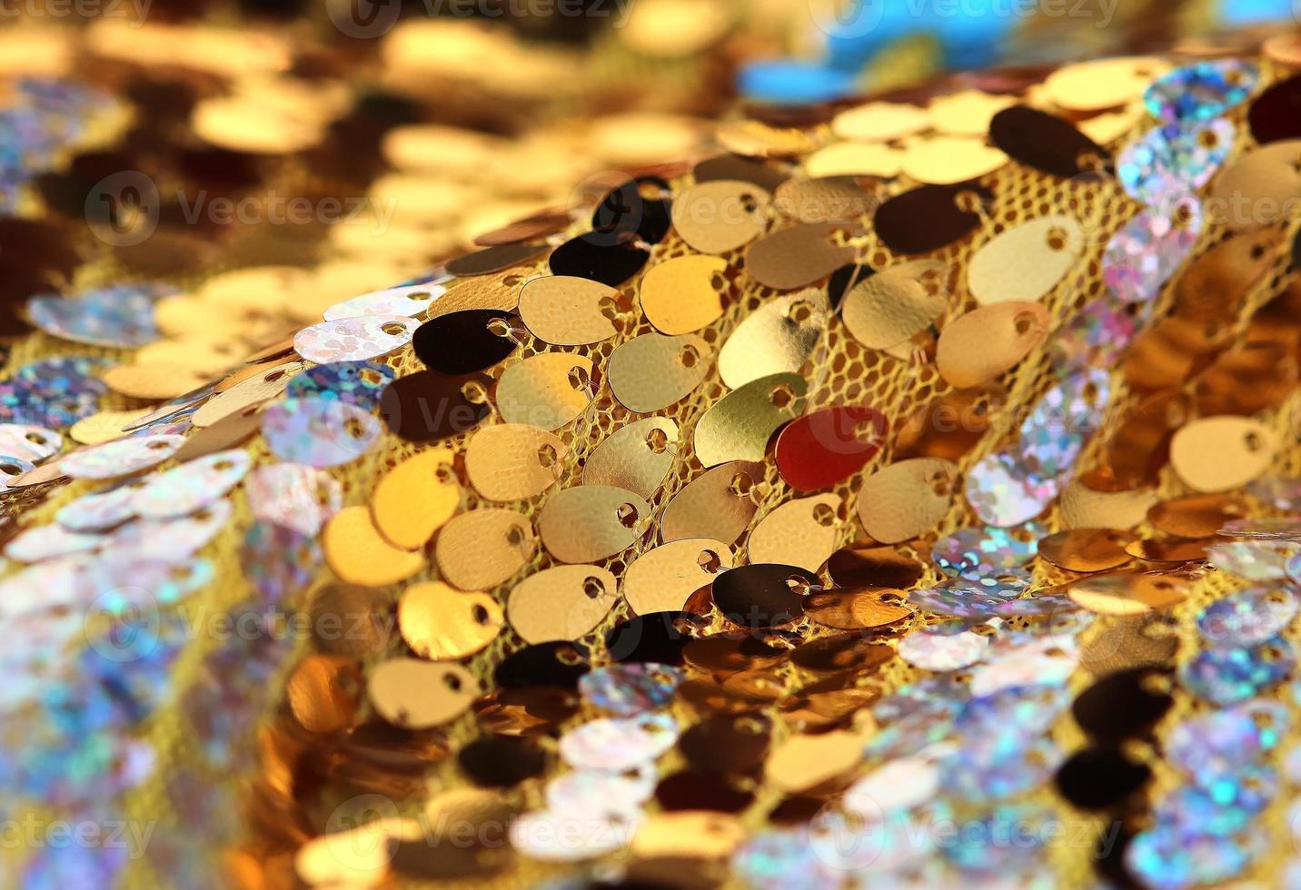 Detailed close up view on samples of cloth and fabrics in different colors found at a fabrics market photo