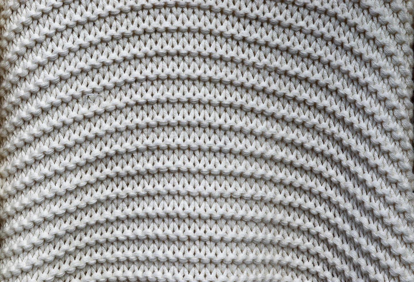 Detailed close up view on samples of cloth and fabrics in different colors found at a fabrics market photo