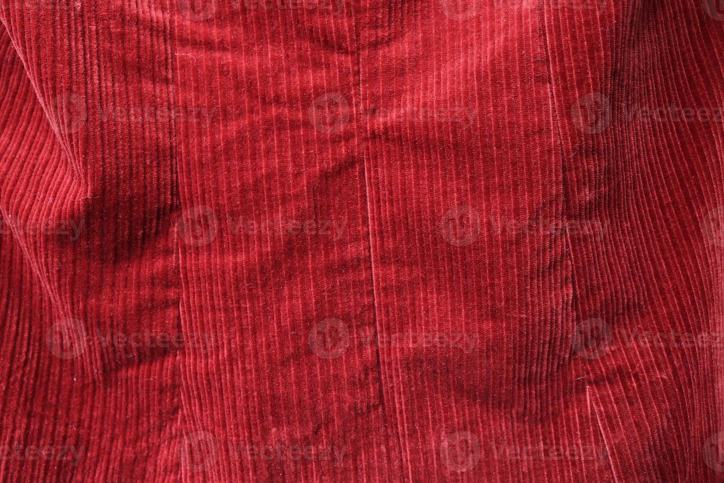 Detailed close up view on samples of cloth and fabrics in different colors found at a fabrics market photo