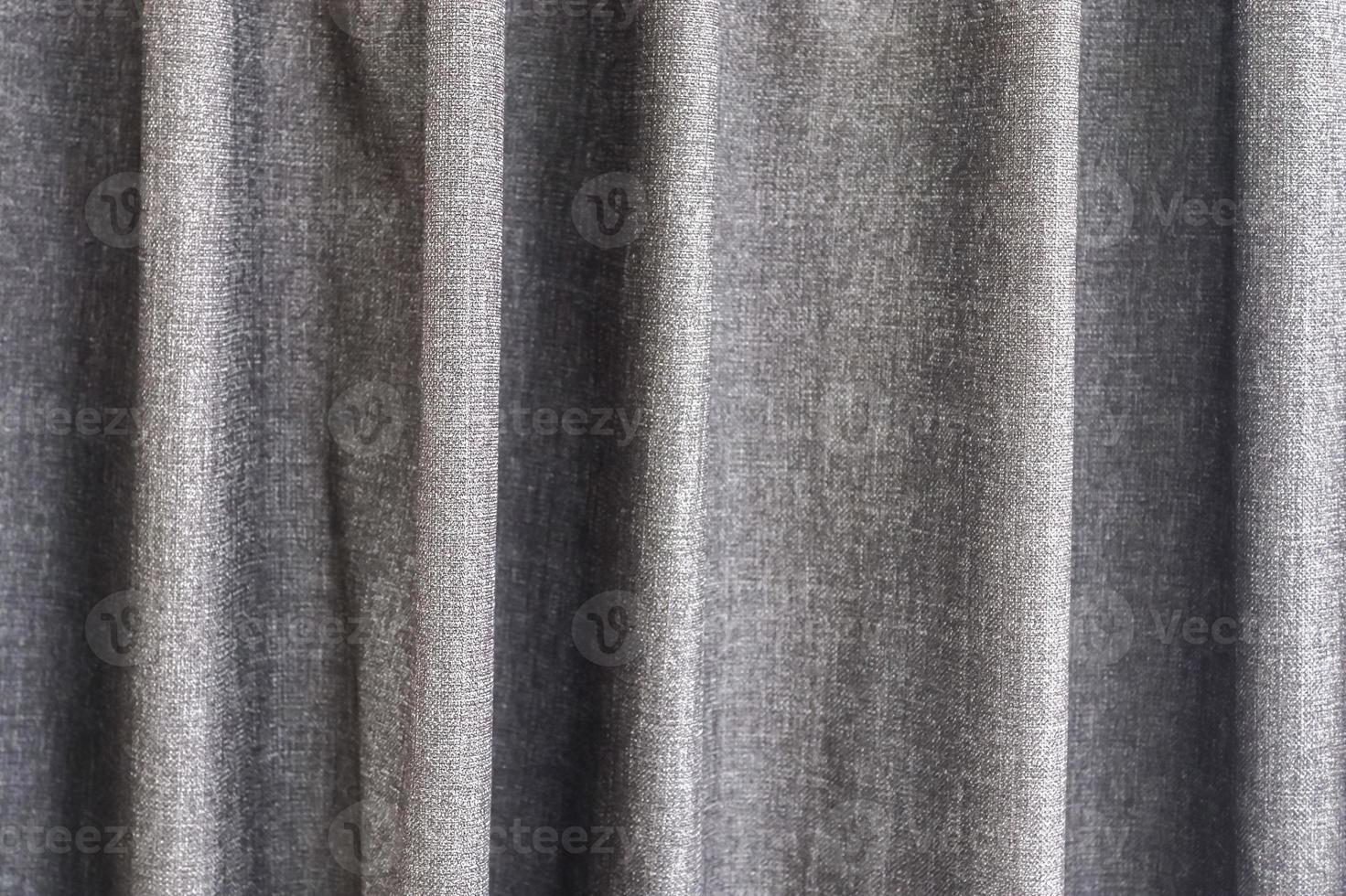 Detailed close up view on samples of cloth and fabrics in different colors found at a fabrics market photo