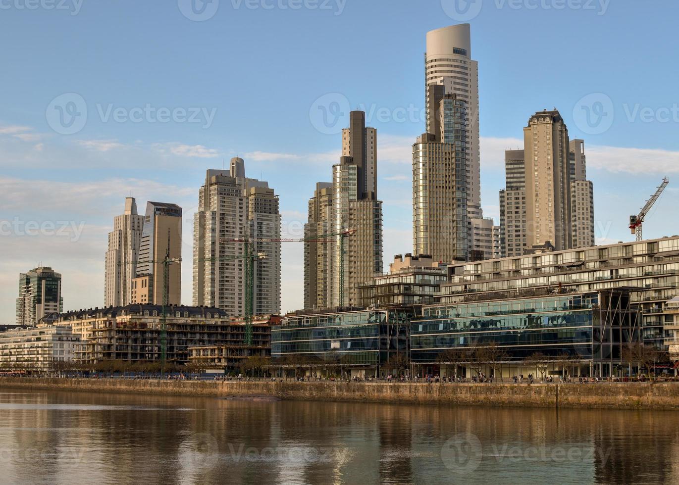 skyline of Puerto Madero, Buenos Aires, against blue sky photo