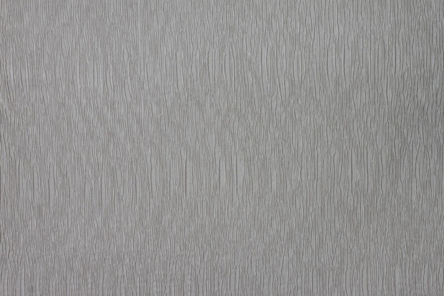 Brown textile textured fabric with streak design for background. photo