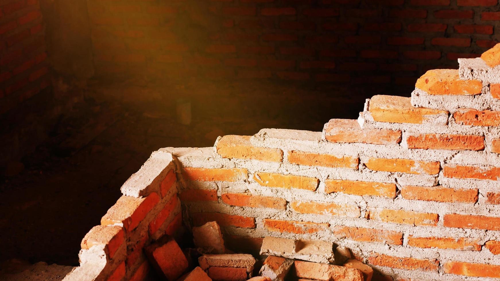 Close-up of the rubble of an industrial building collapsing into a pile of concrete and brick. and the jagged debris caused by the failure of the engineers at the abandoned construction. photo