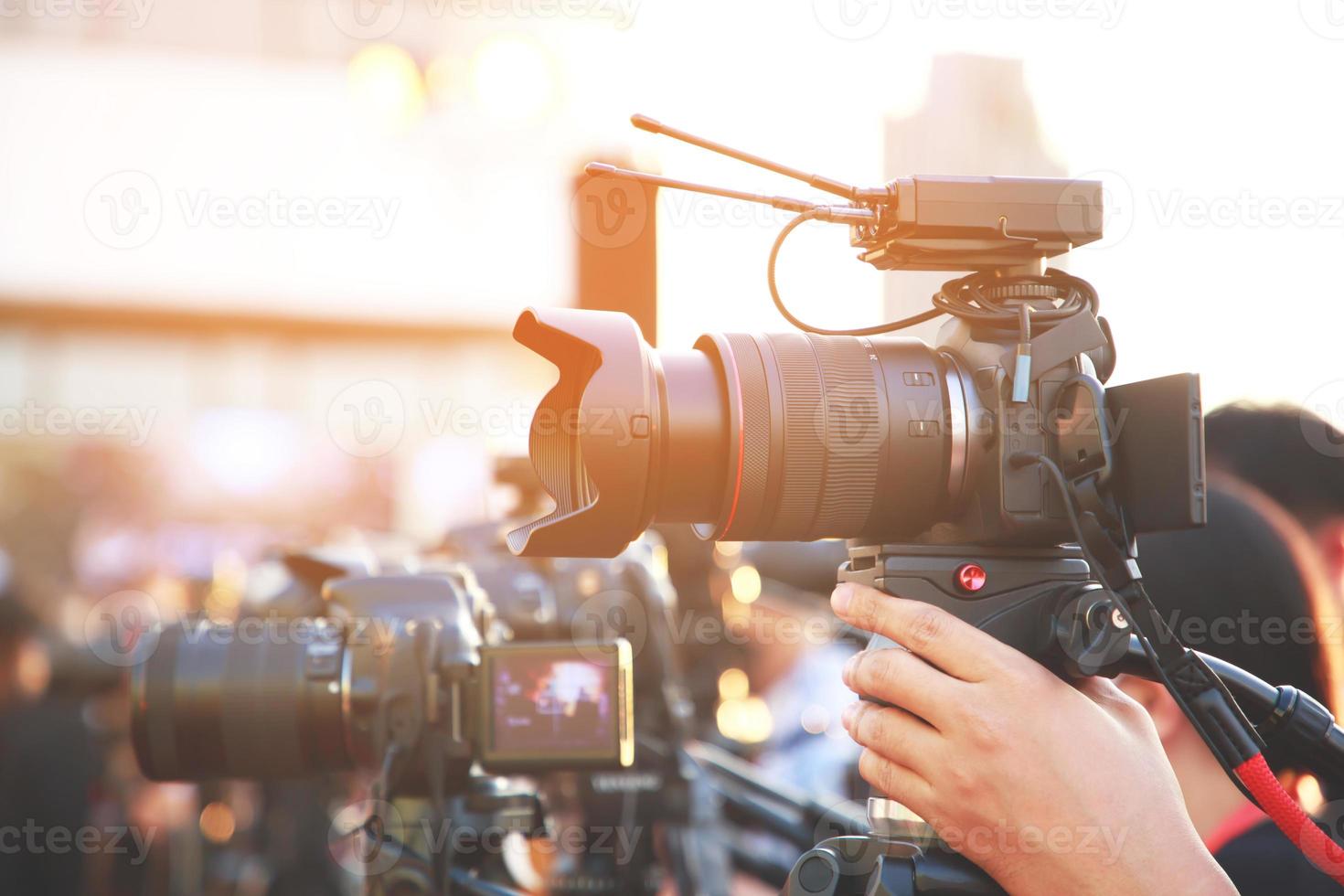 media photographer with entertainment reporters Interviewing celebrities and actors at a fashion show photo