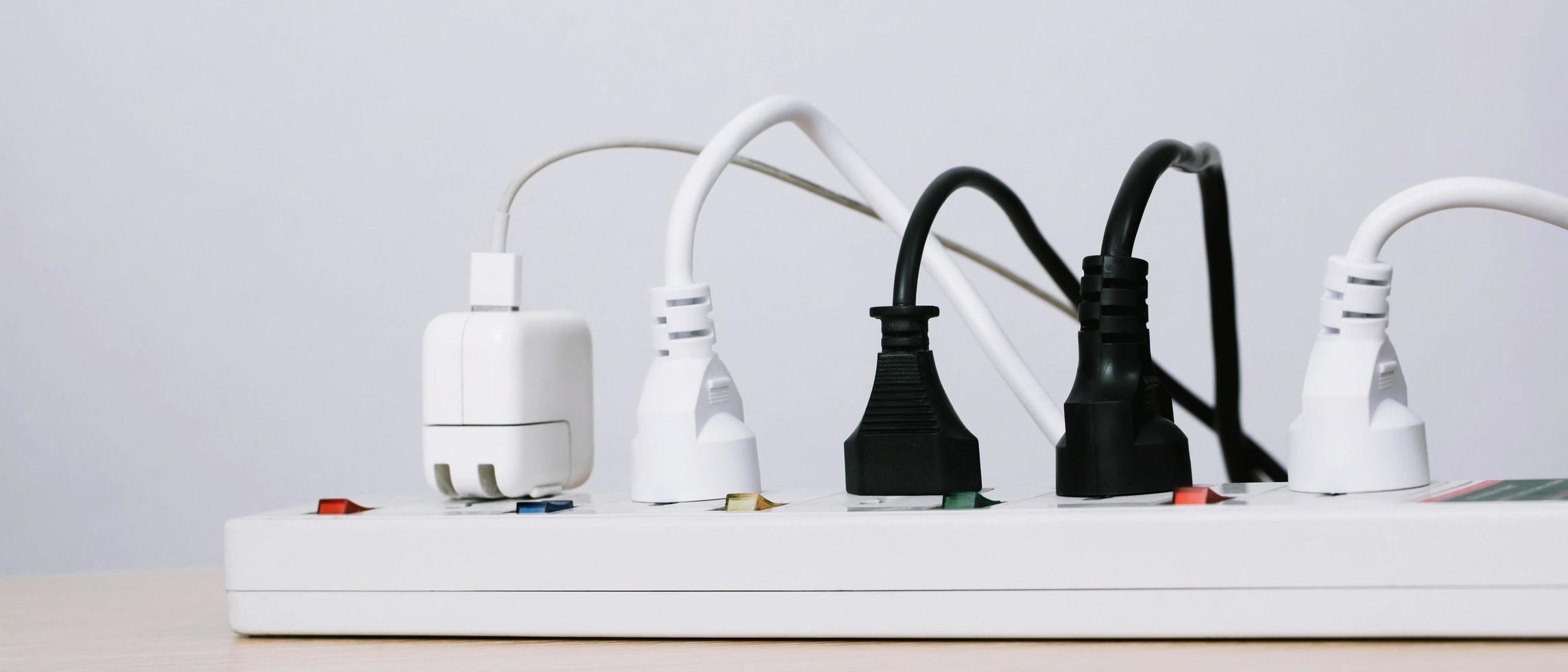Electrical appliances plugs full of all plugs or plugs together. Because of the risk of causing a short circuit from high heat accumulated in the wires. photo