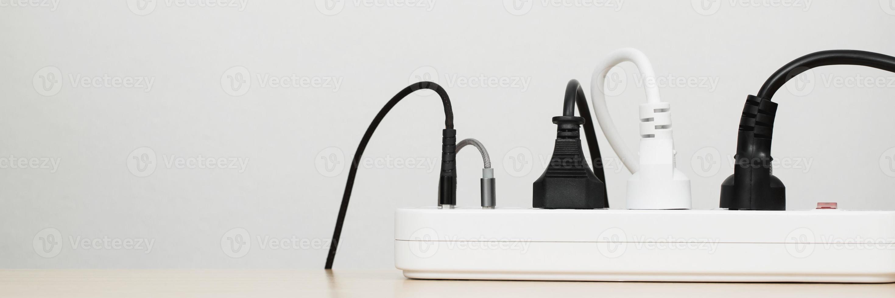 Electrical appliances plugs full of all plugs or plugs together. Because of the risk of causing a short circuit from high heat accumulated in the wires. photo