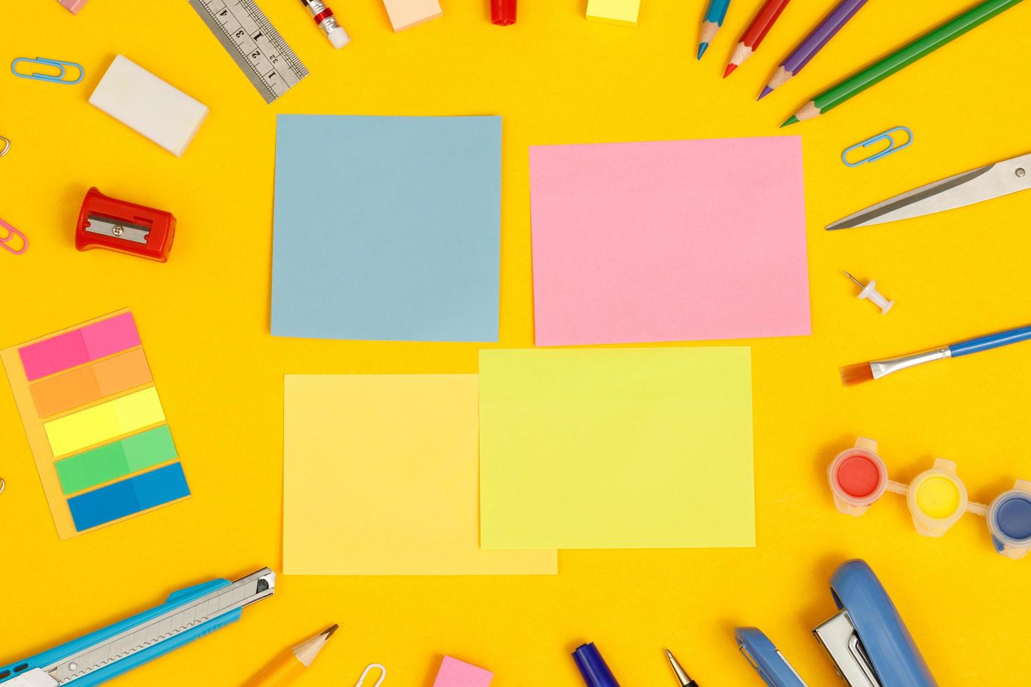 Top view notebooks and accessories studying in the library at school yellow background idea education photo