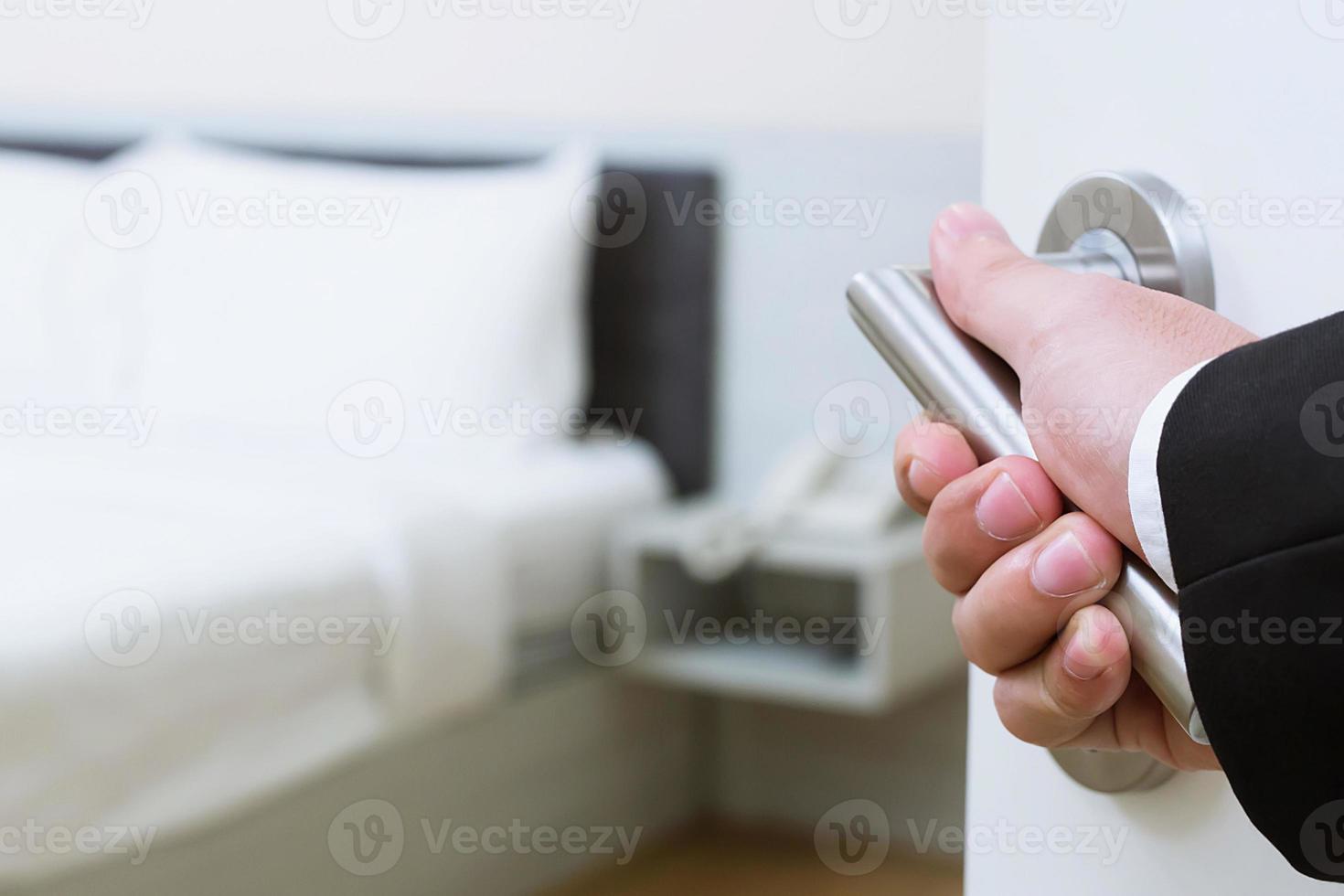 close up showing hand of receptionist opening hotel room , Welcome guests to the hotel. photo