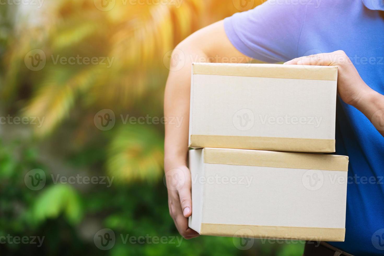 protect Hygiene germ and bacteria of a package through a service send to home. hand holding consign and submission customer accepting a of box photo