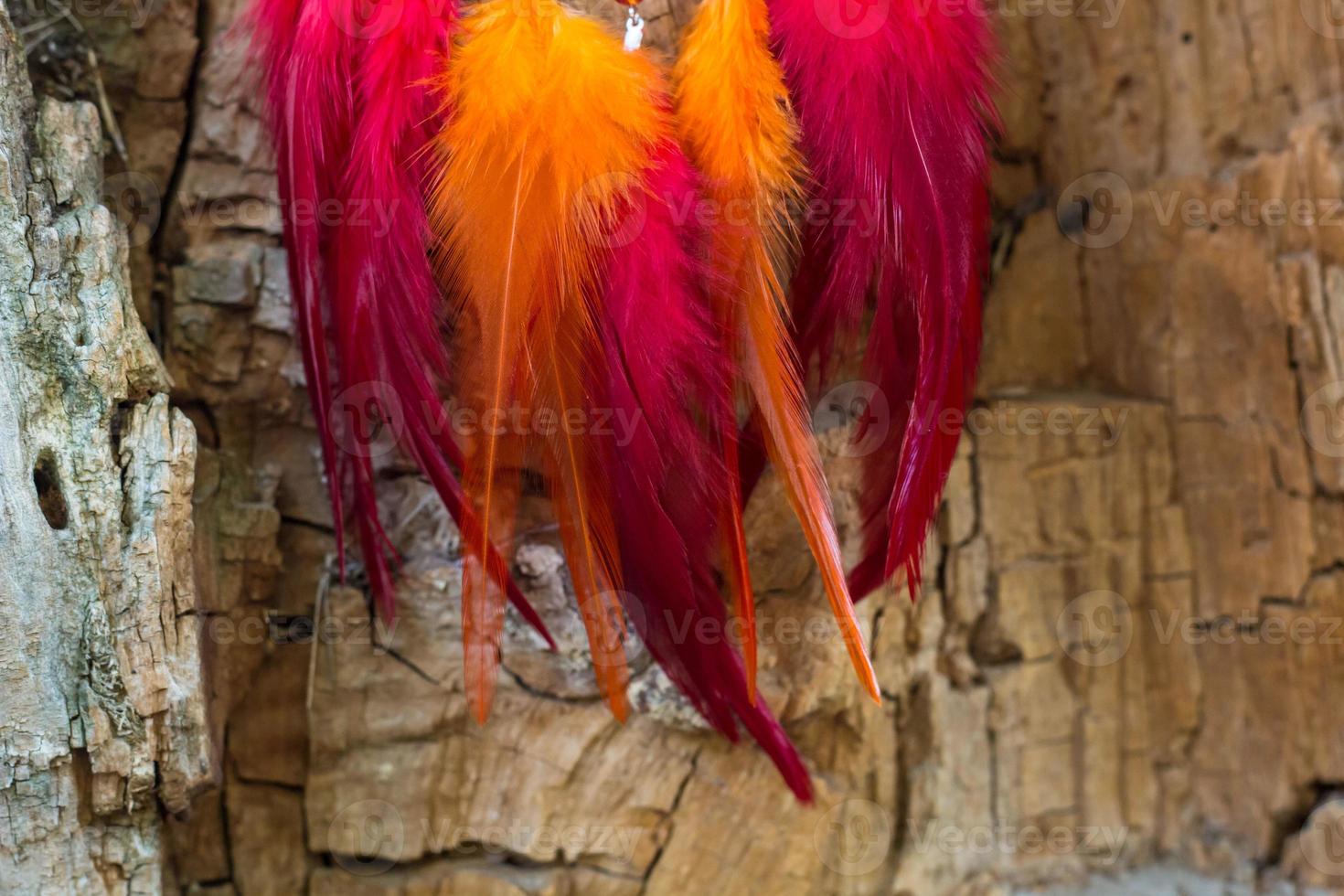 Handmade dream catcher with feathers threads and beads rope hanging photo