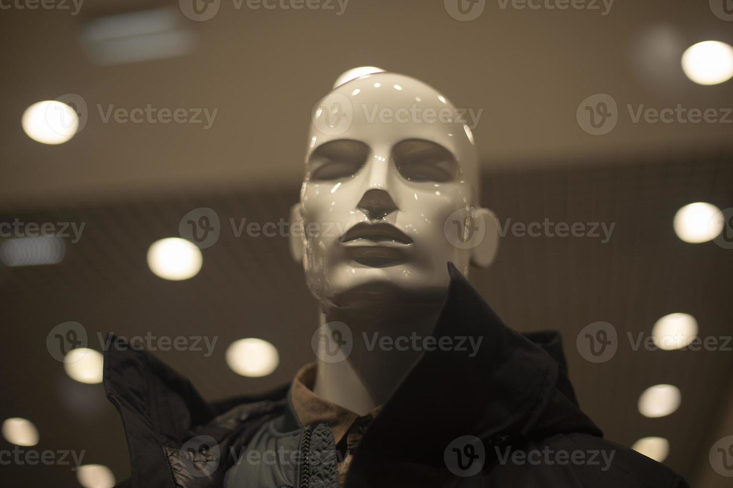 Men's mannequin in a jacket. Outerwear in the store. Showcase of men's clothing store. Details of modern fashion. photo