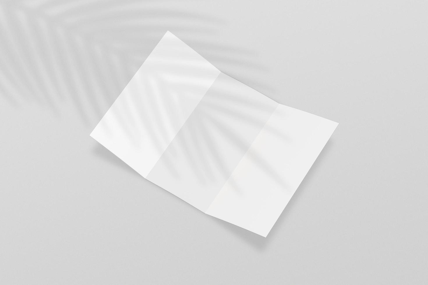 Blank white tri folded booklet mock up, opened, front and back side, top view, 3d rendering. Plain trifold brochures mockups set isolated. Book cover and three flier inside with shadow overlay. photo