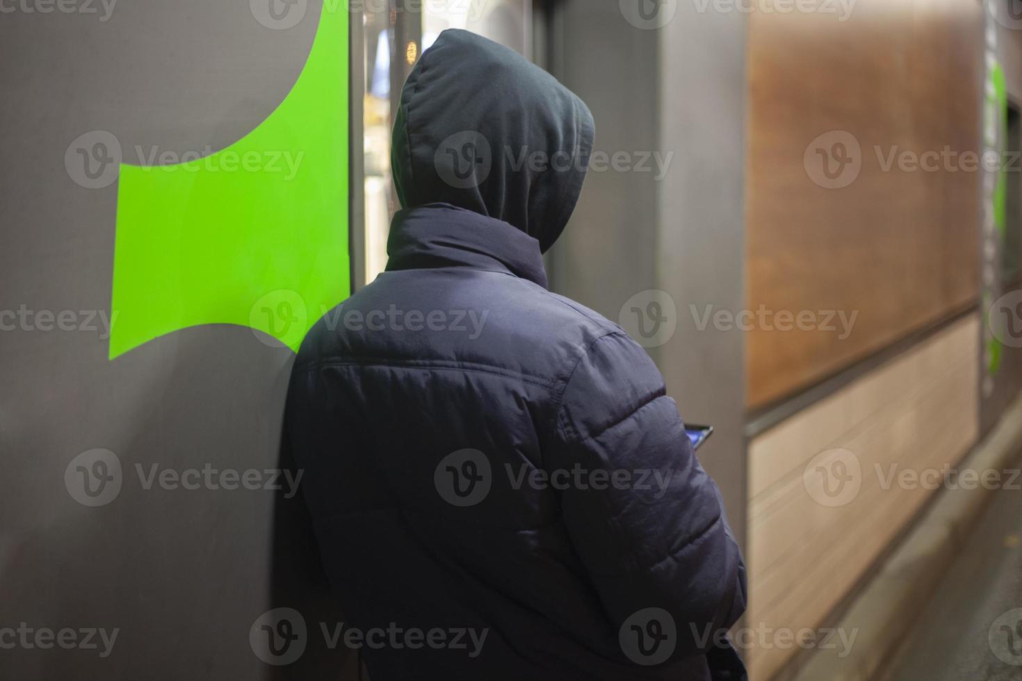 Unknown in a black hood. photo