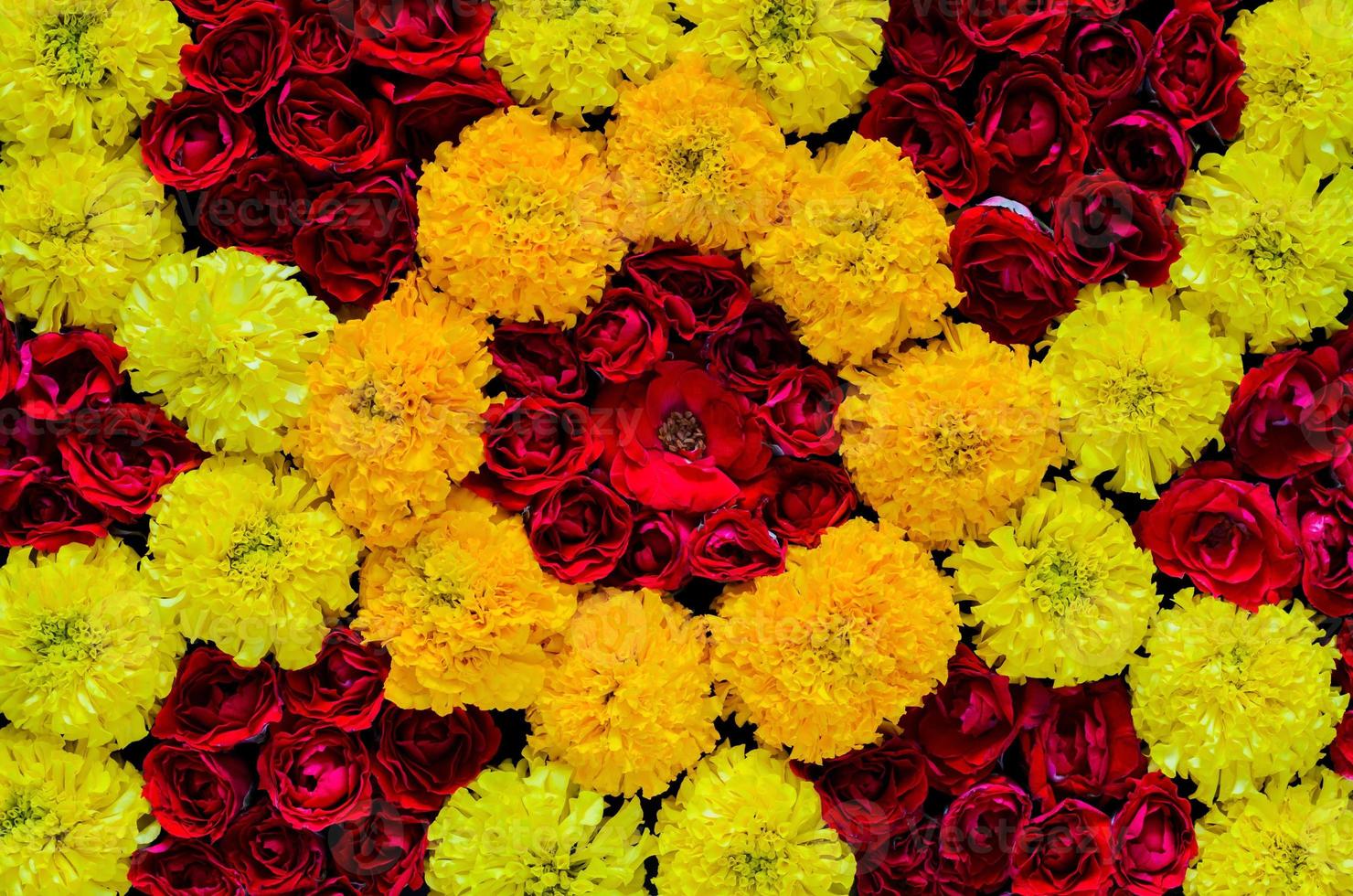 Decorative rose and marigold flowers rangoli for Diwali festival background. photo