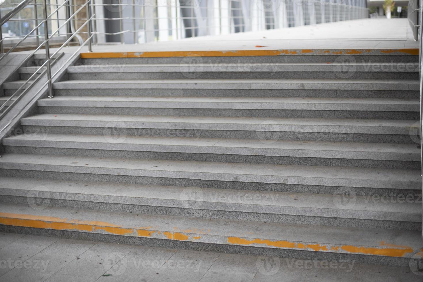 Stairs in the pedestrian crossing. Steps made of stone. photo