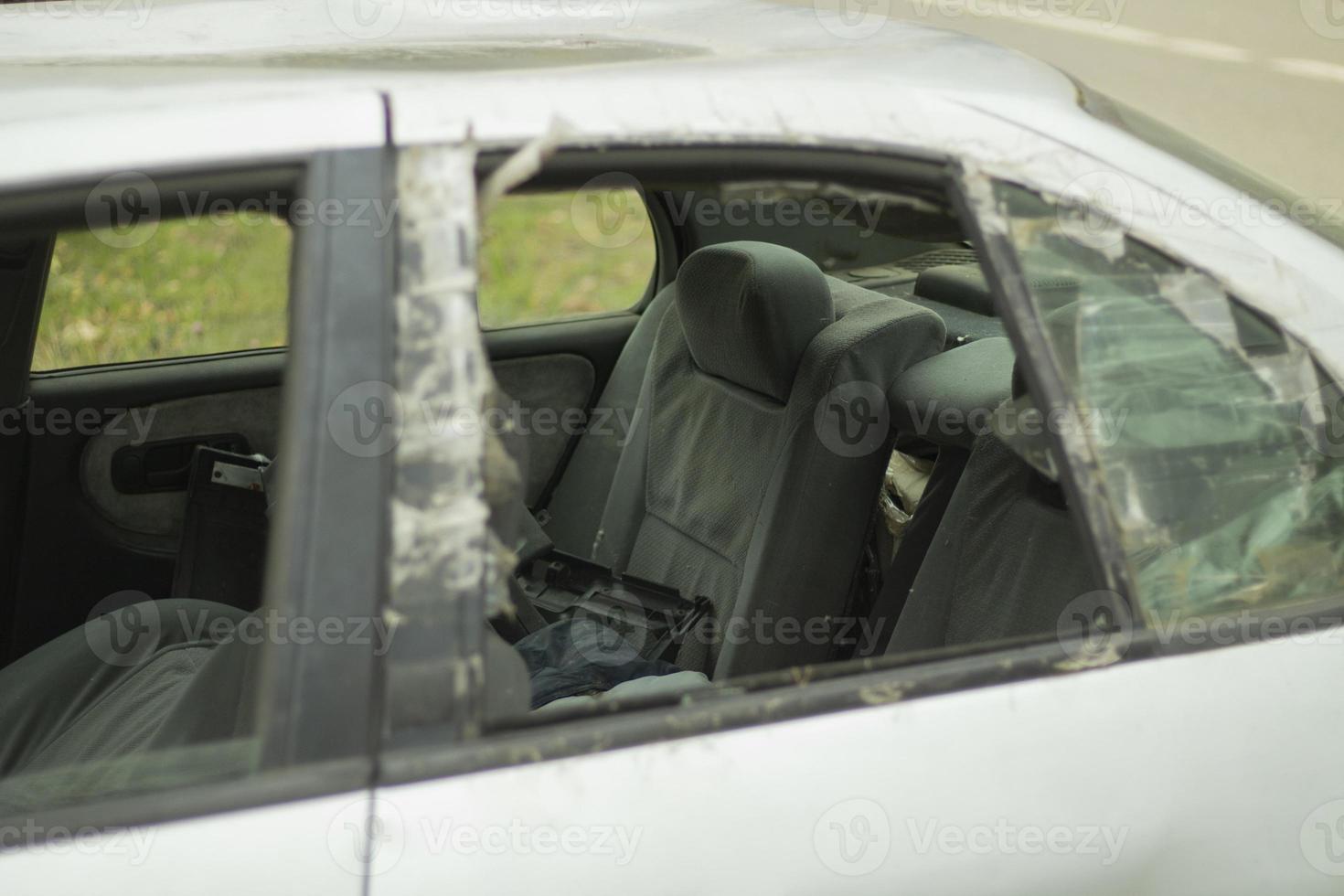 Broken car glass. Broken window in transport. photo