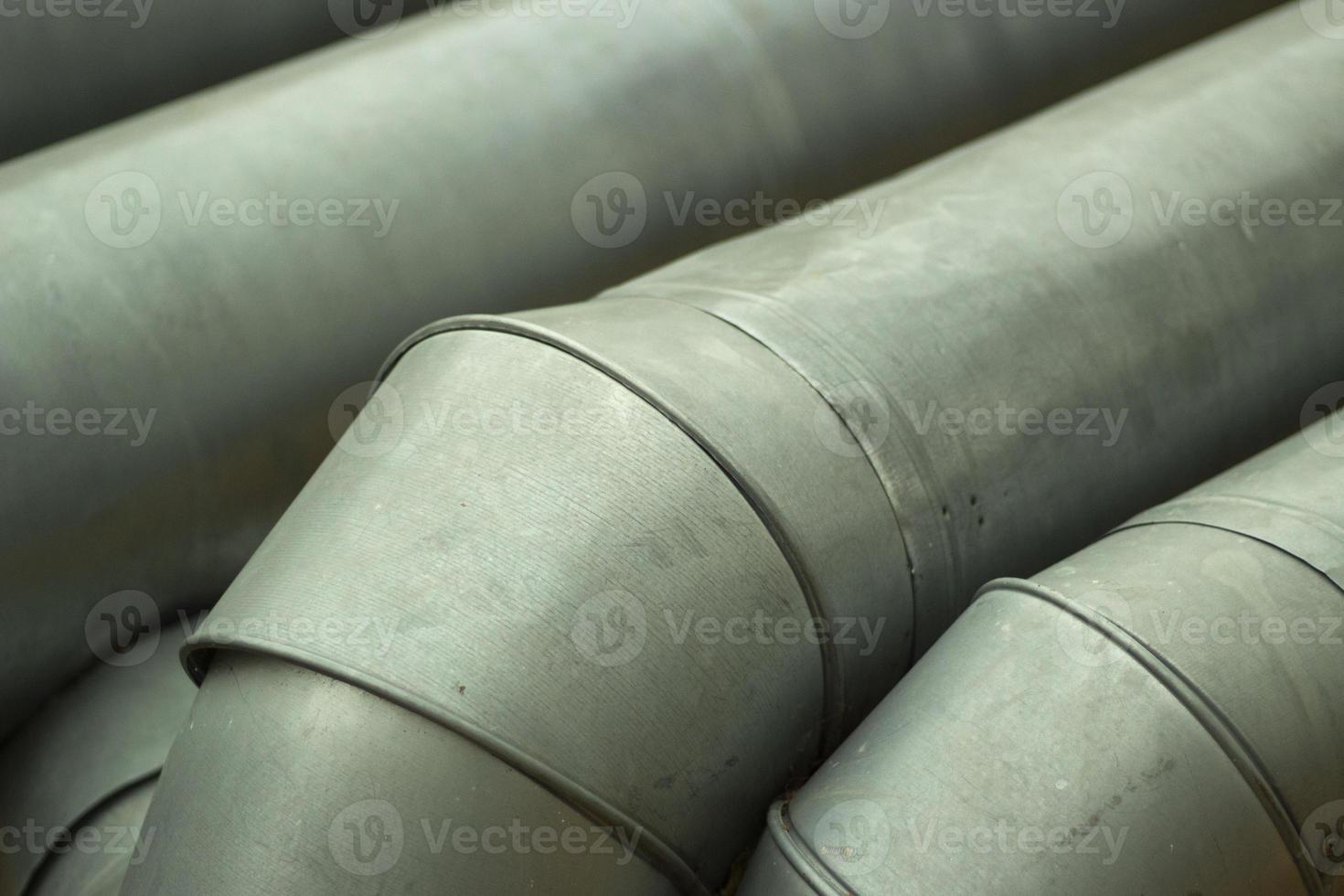 Bending of pipes. Industrial stainless steel pipes. Industry details. photo