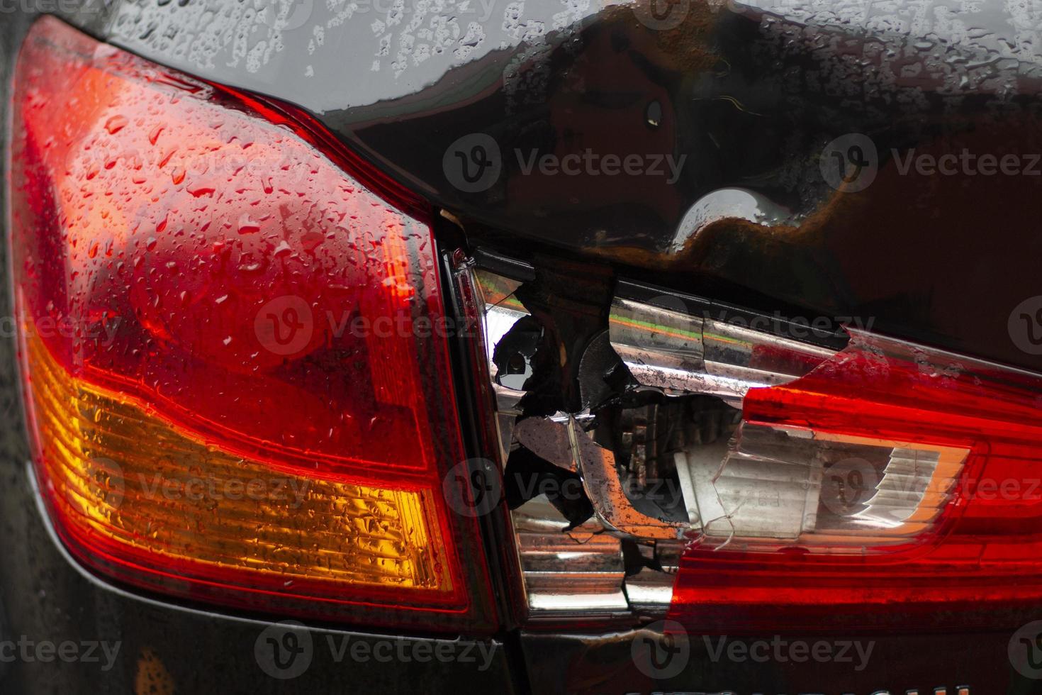 Broken headlamp. Damage to the machine lamp. Transport after a light collision. photo