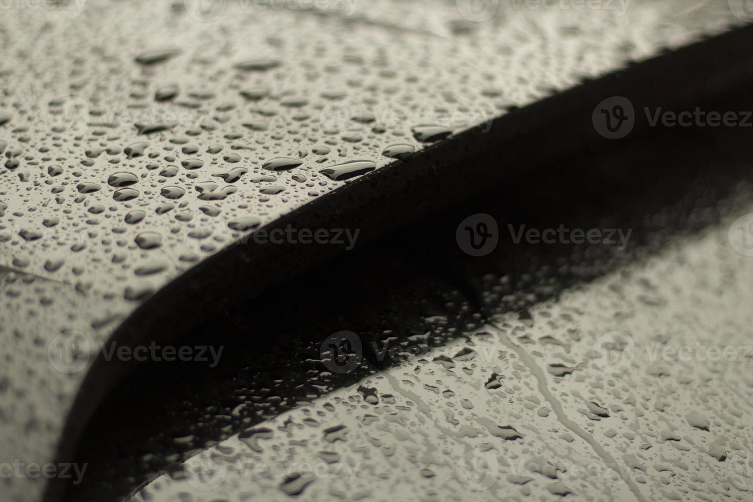 Parts of a wet car. Drops on the surface of the machine. photo