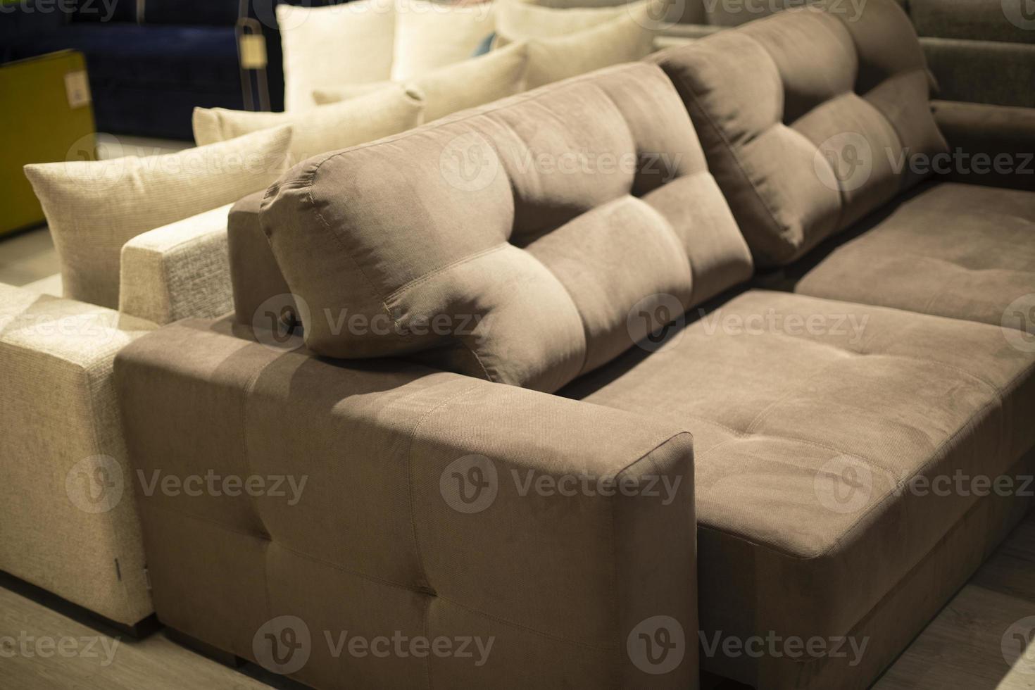 Soft sofa. Furniture in the store. Interior in the room. photo