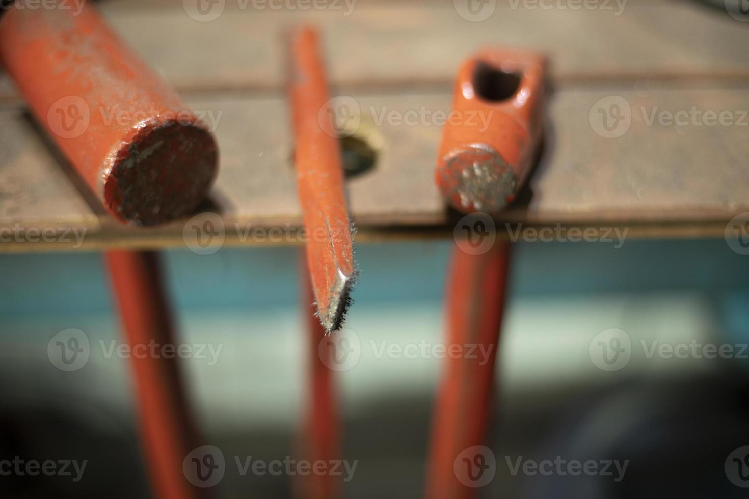 Working tools in the garage. Details of the metal workshop. photo