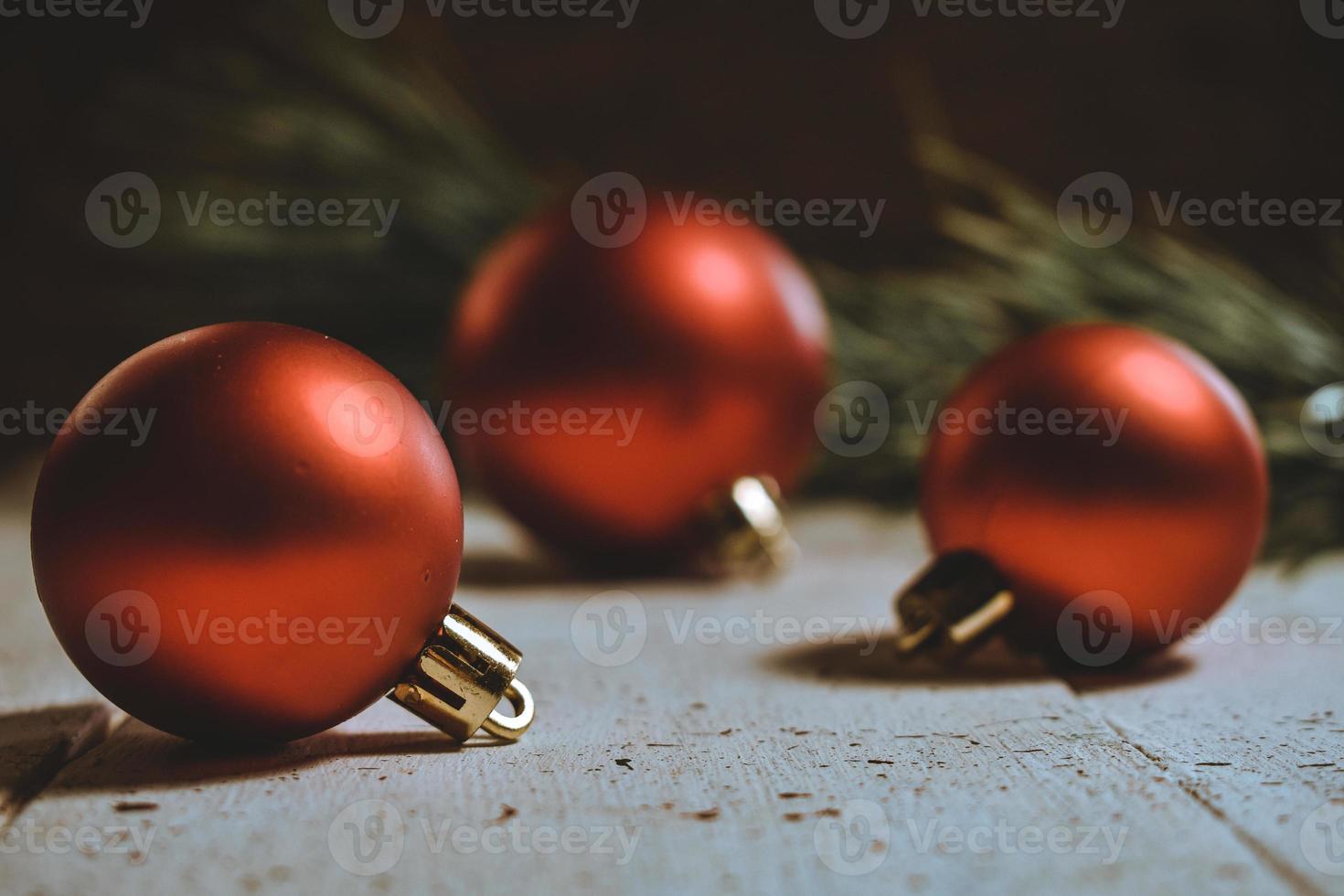 Christmas balls ornaments on wooden photo