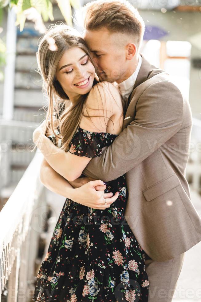 Young couple in love posing on camera photo