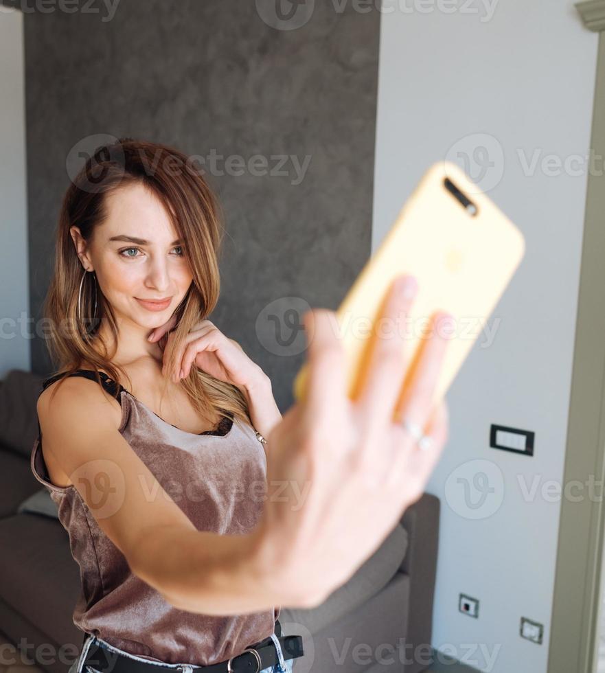 Close up portrait of beautiful cheerful woman photo