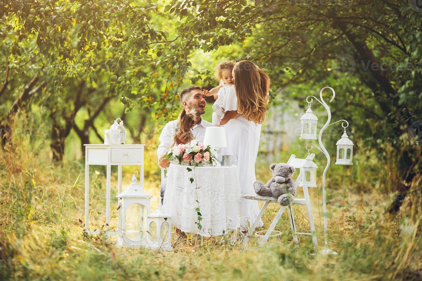 Young family with child at a picnic photo