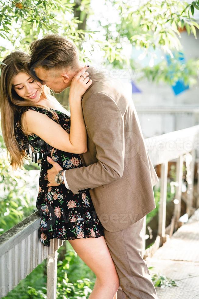 Young couple in love posing on camera photo