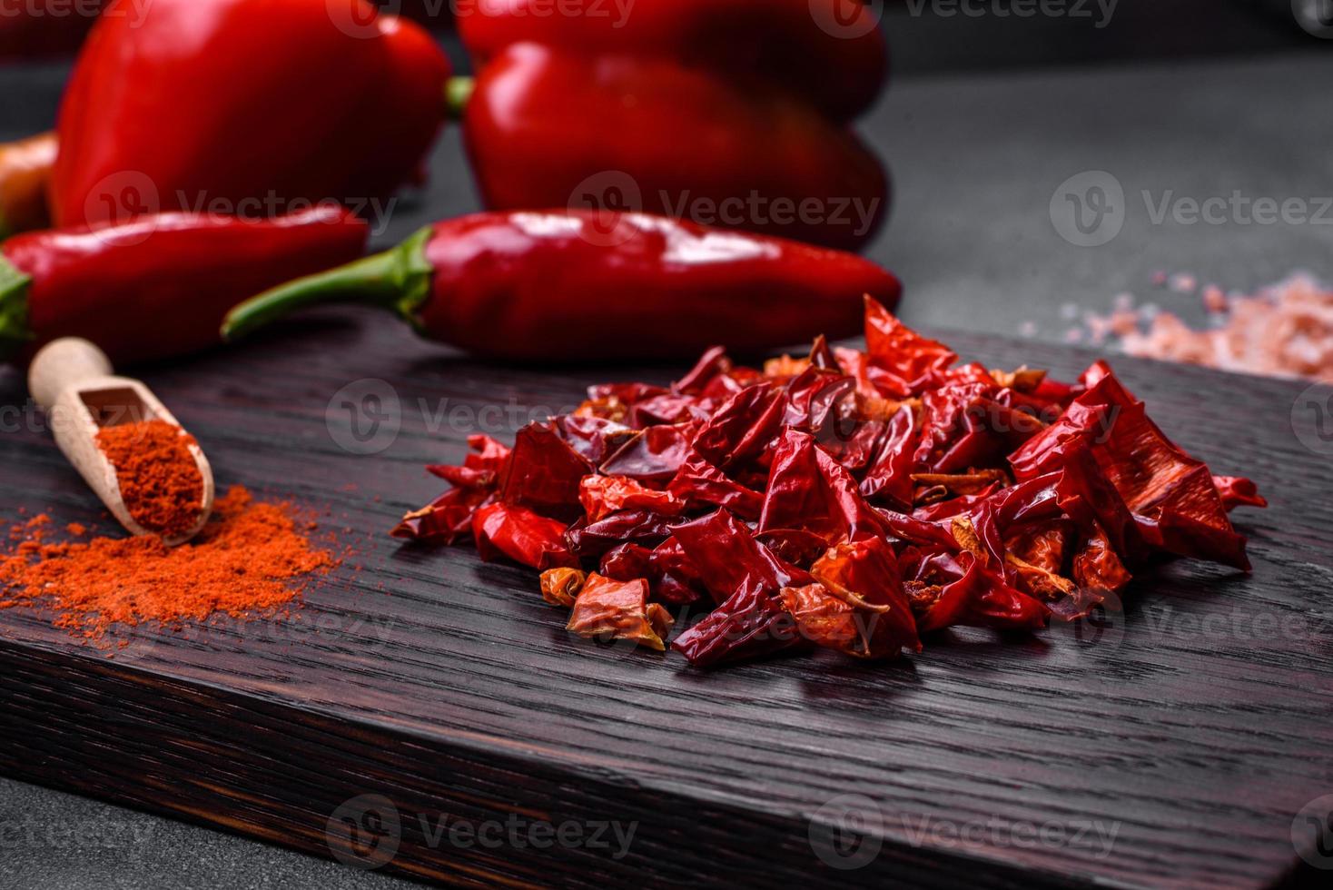 Pieces of dried paprika, preparation of powder spice for various dishes photo