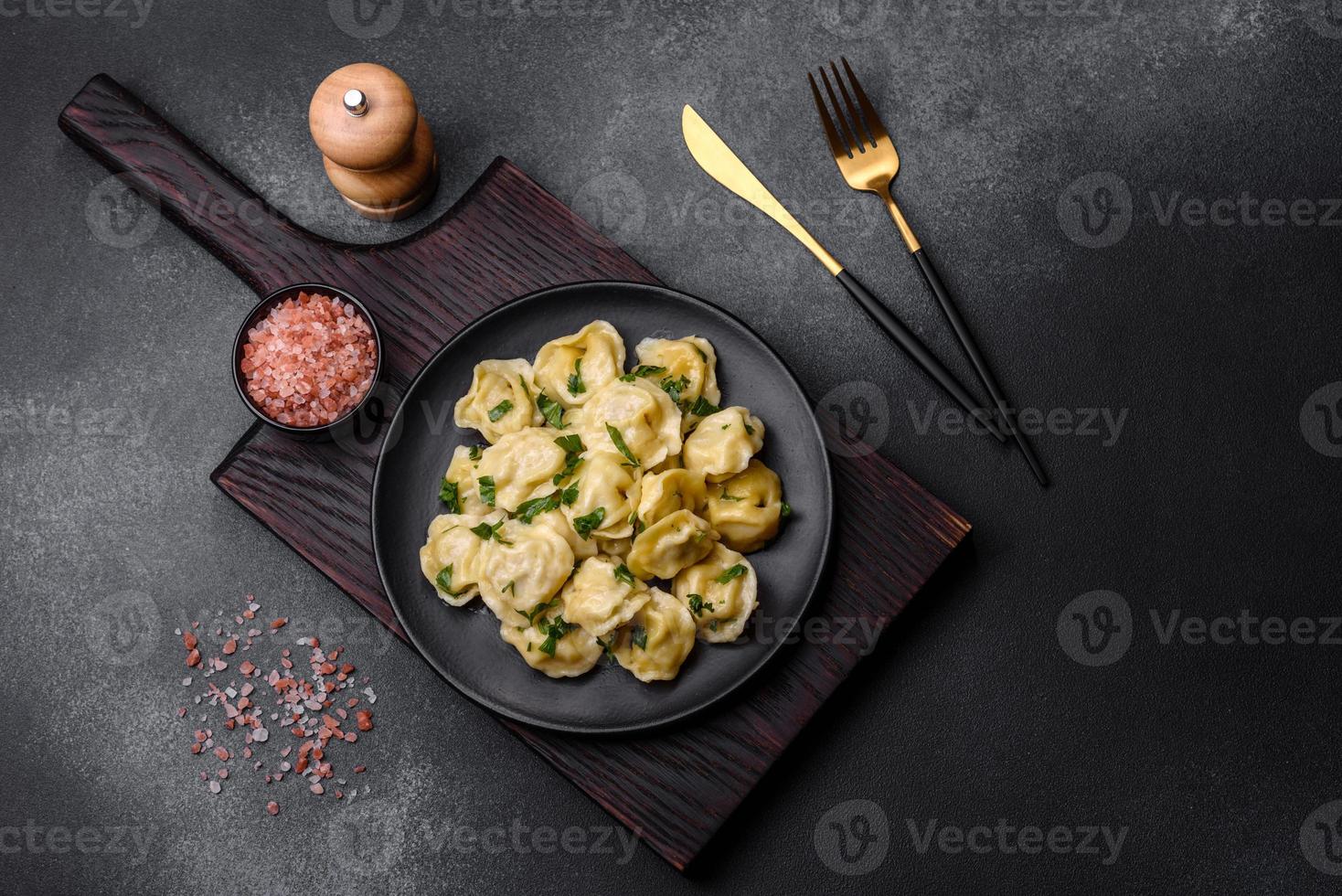 Delicious fresh dumplings with turkey meat, with spices and herbs photo