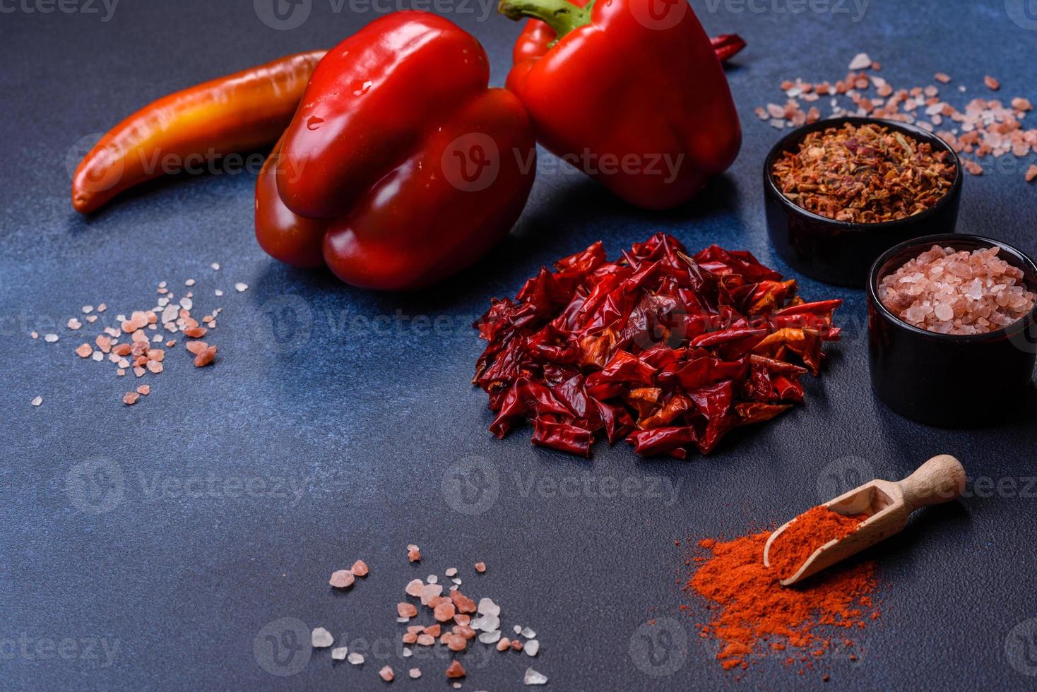 Pieces of dried paprika, preparation of powder spice for various dishes photo