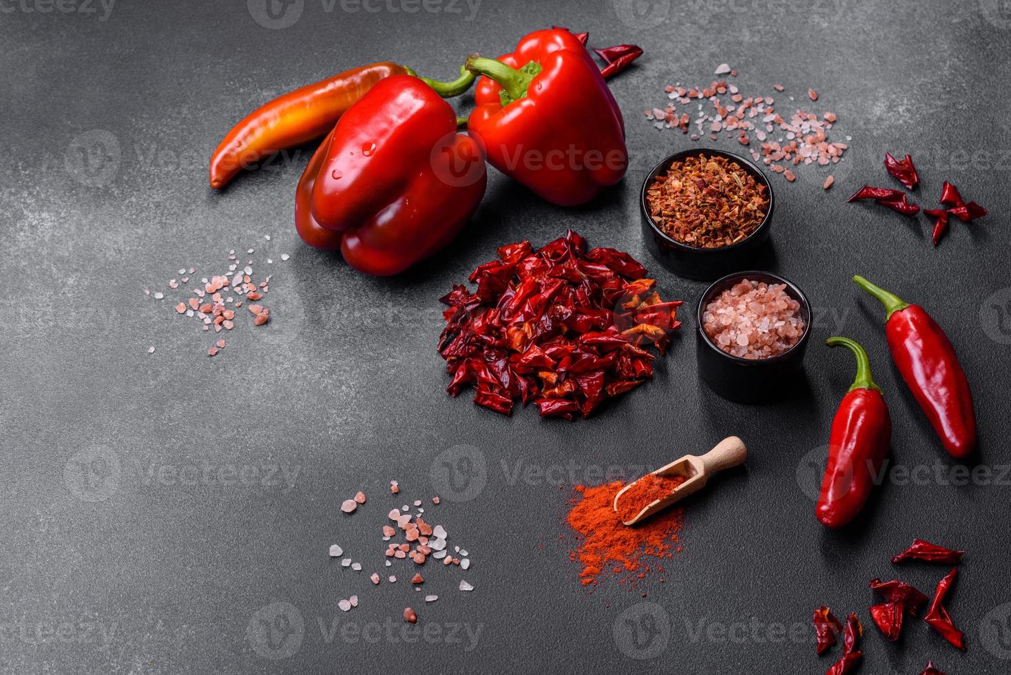 Pieces of dried paprika, preparation of powder spice for various dishes photo