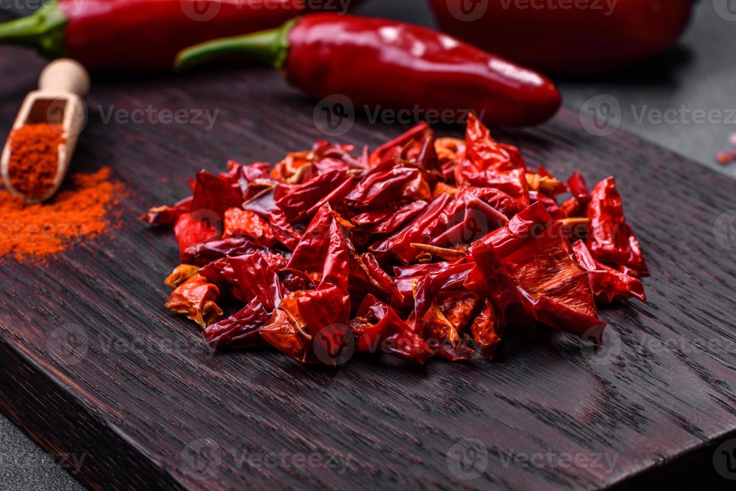 Pieces of dried paprika, preparation of powder spice for various dishes photo