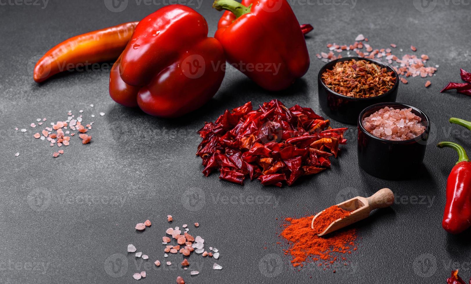 Pieces of dried paprika, preparation of powder spice for various dishes photo