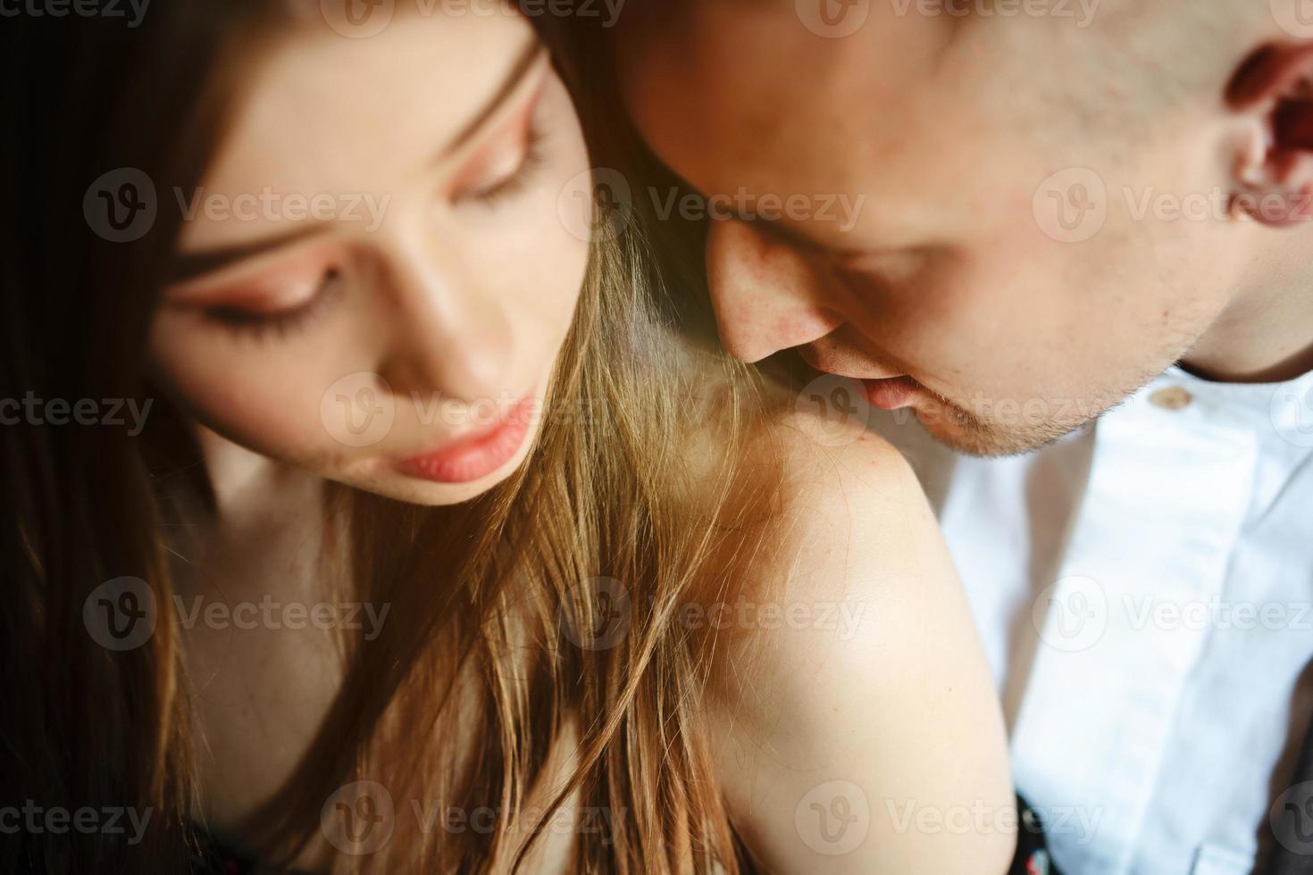 Young couple posing at the camera photo