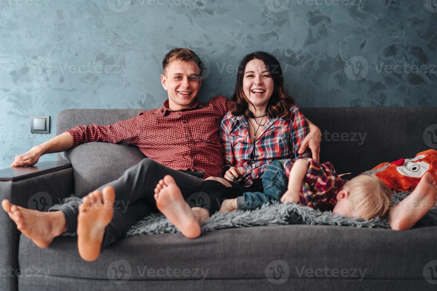 Happy family on the couch photo