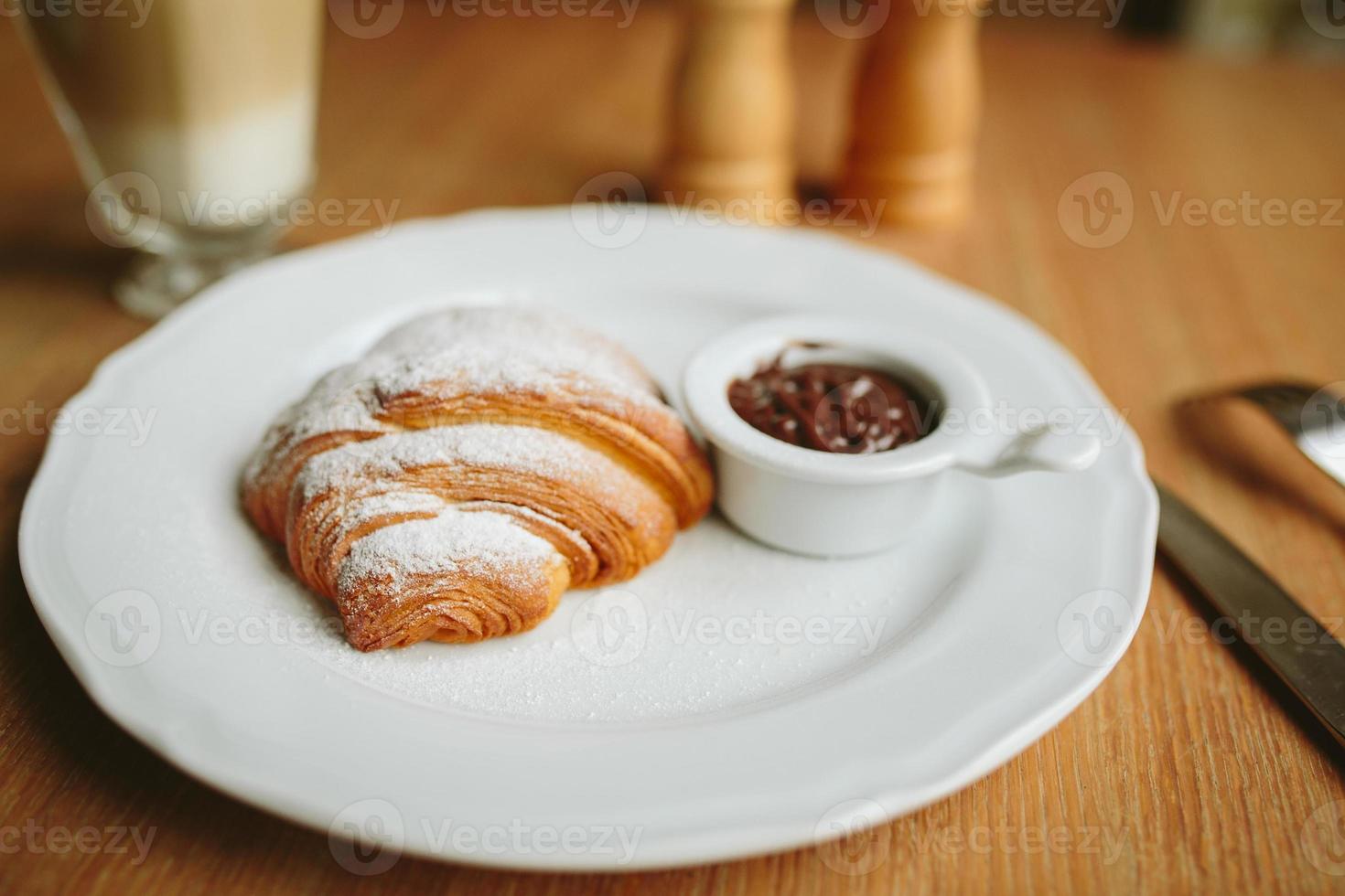 croissant with chocolate photo
