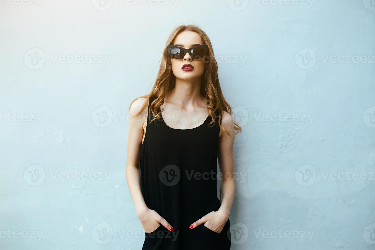 Attractive fashion woman in black dress photo