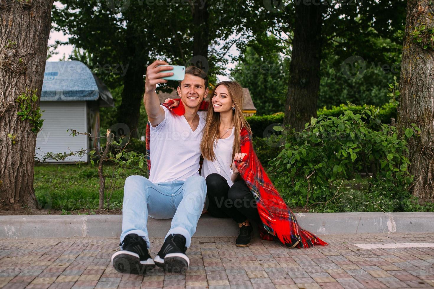 Beautiful young couple makes selfie photo