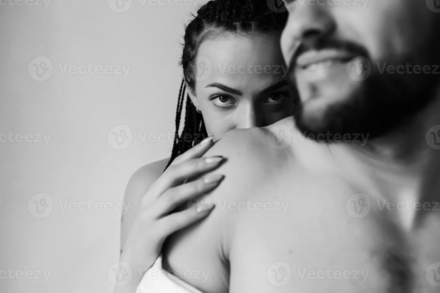 man and woman in the bedroom photo