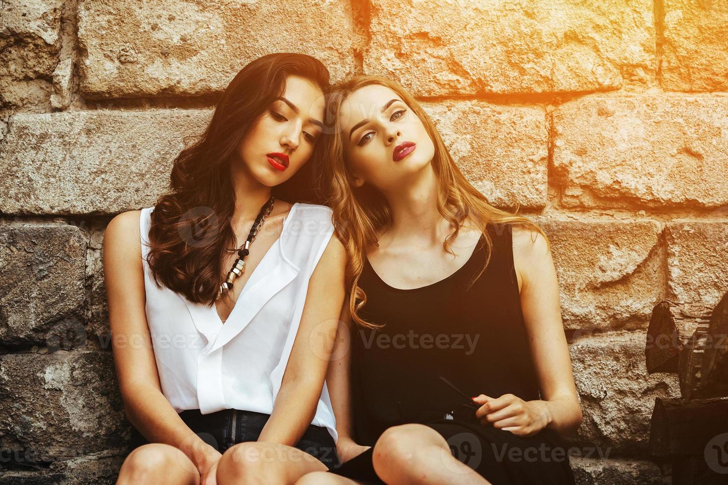 Two young beautiful girls photo