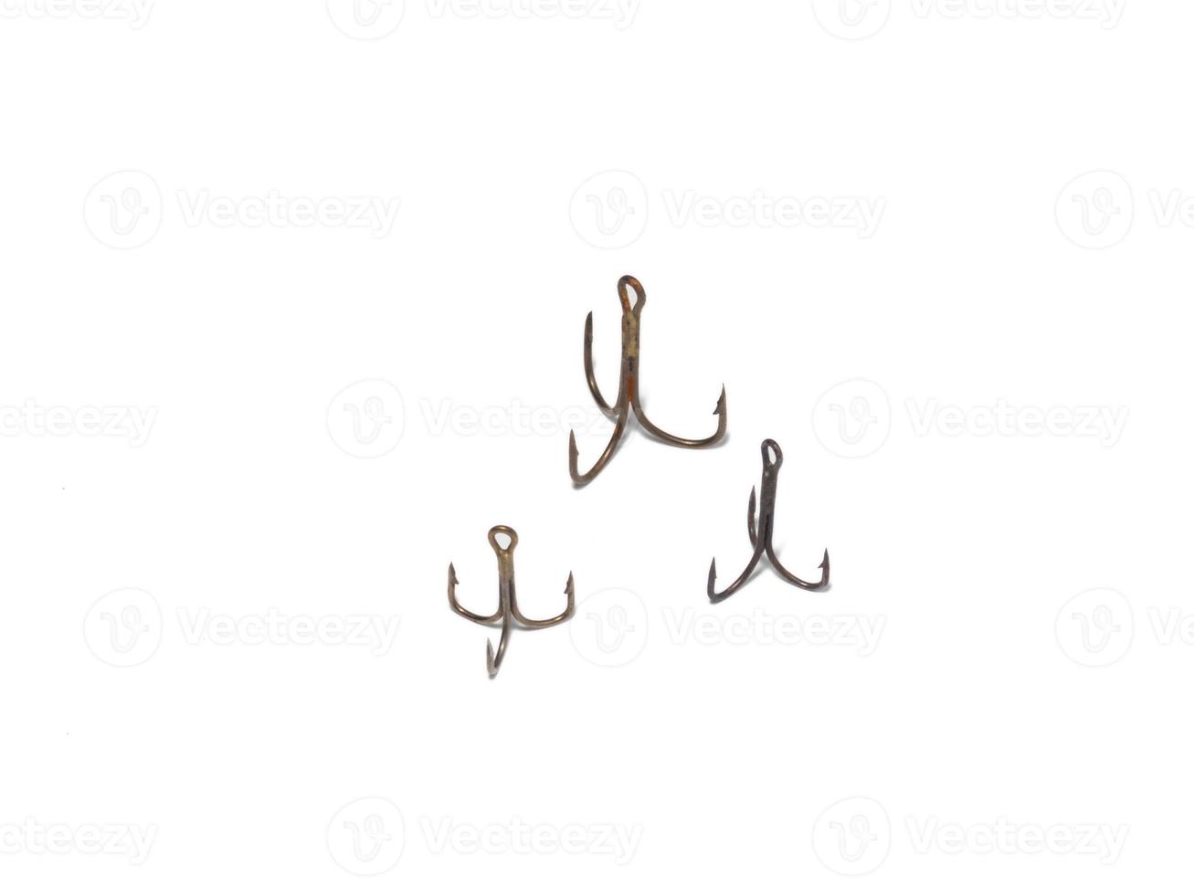 Triple hooks on a white background. Fishing. photo