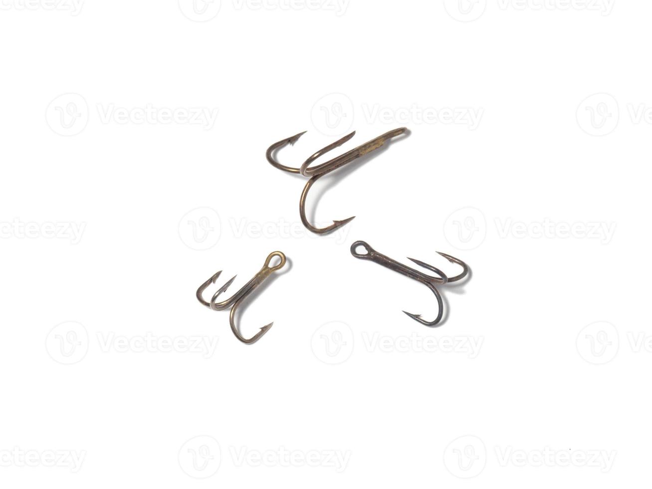 Triple hooks on a white background. Fishing. photo