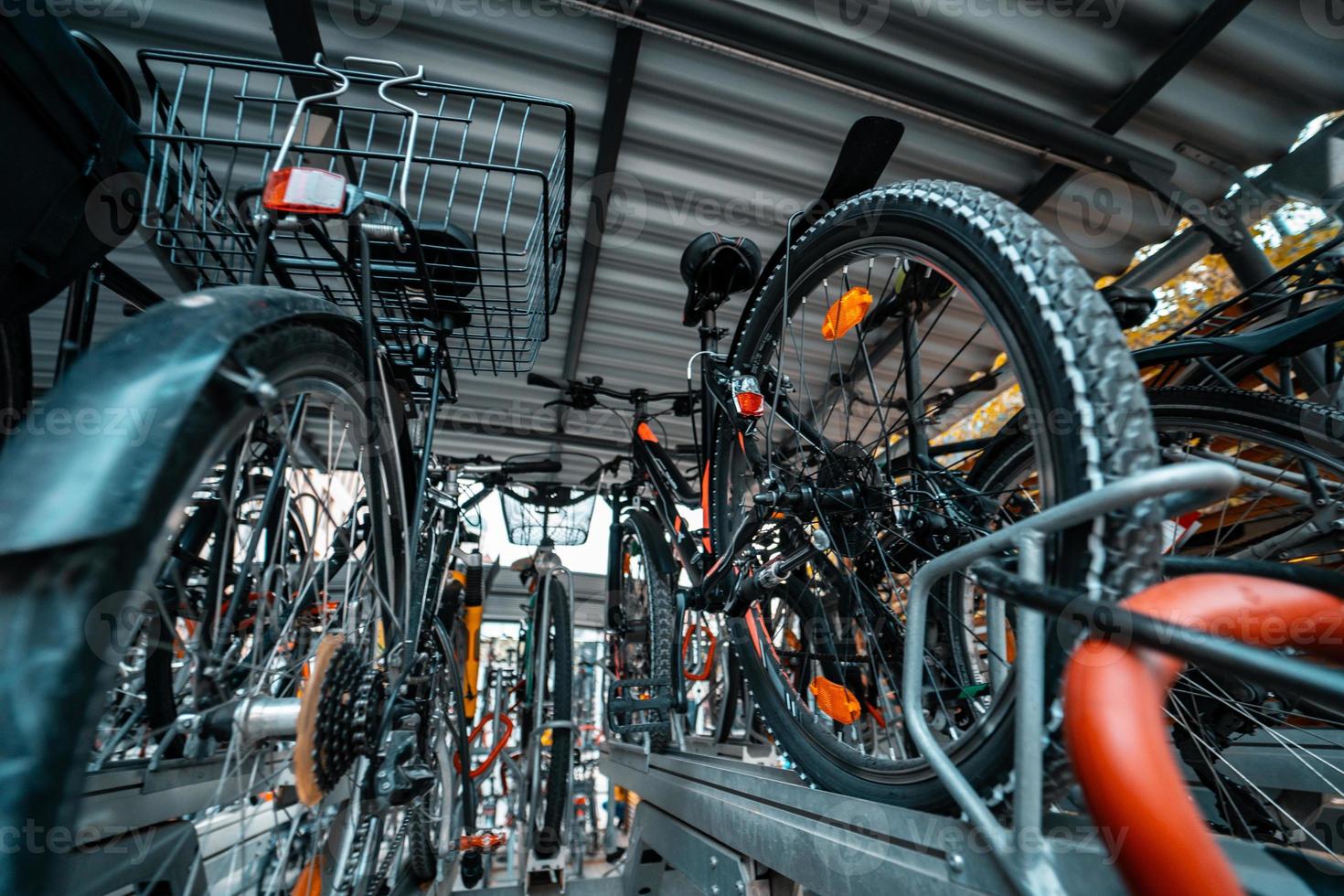 Many bicycle in a row. Bicycle parking at the street photo