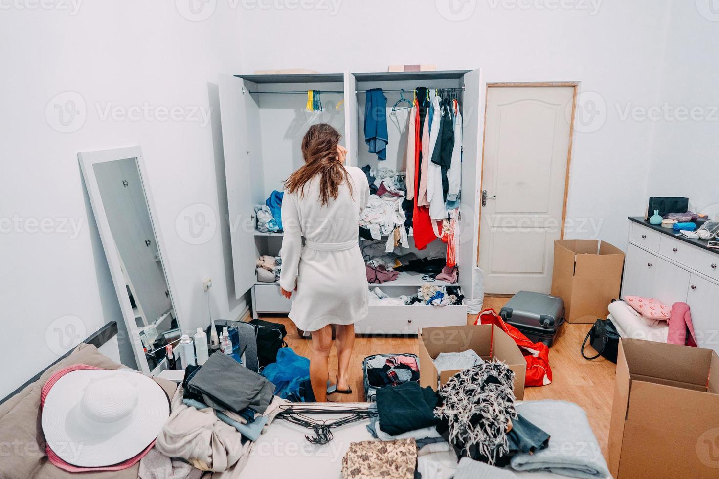 Nice-looking lady inside modern apartment room prepare to trip photo