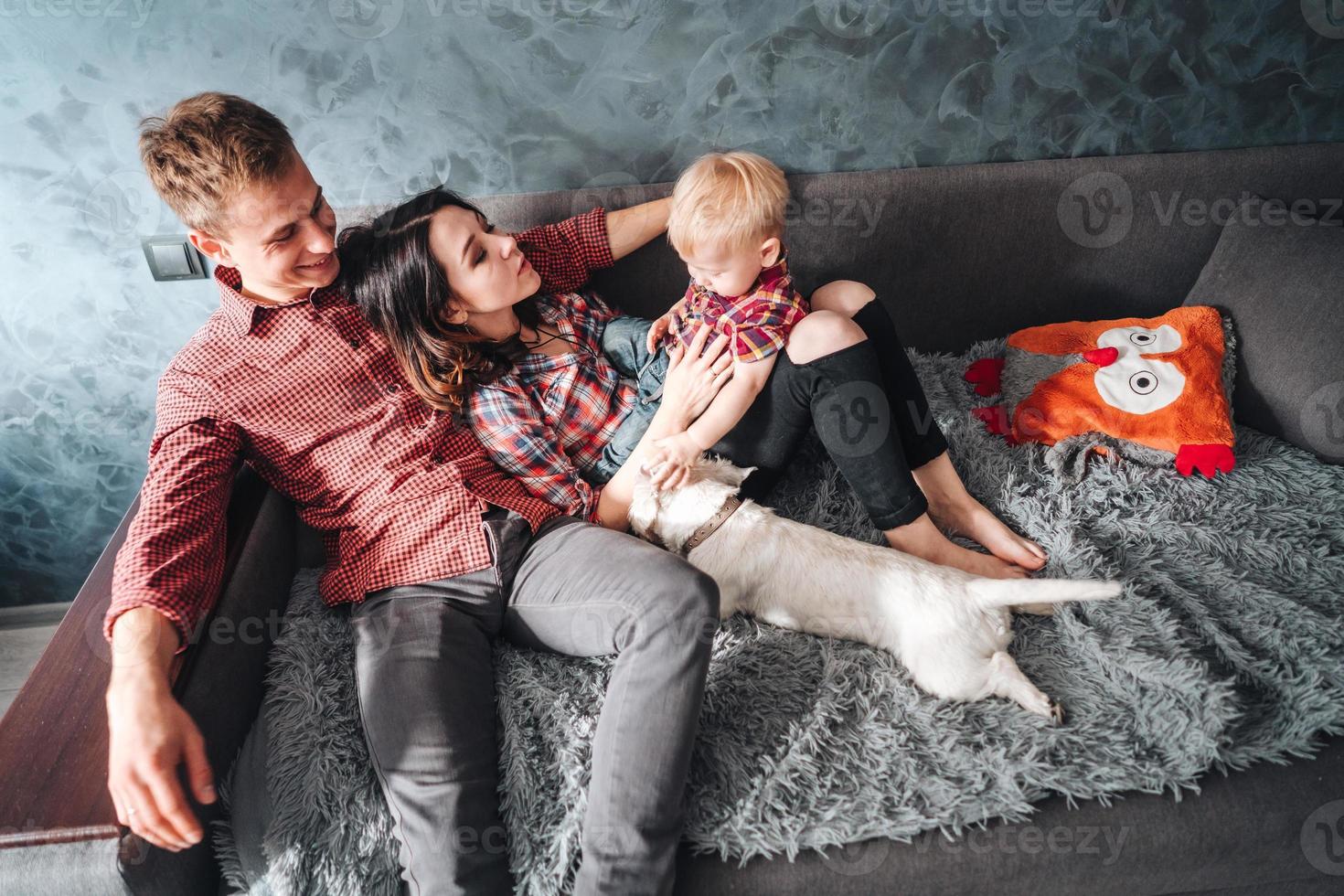 Happy family with puppie photo