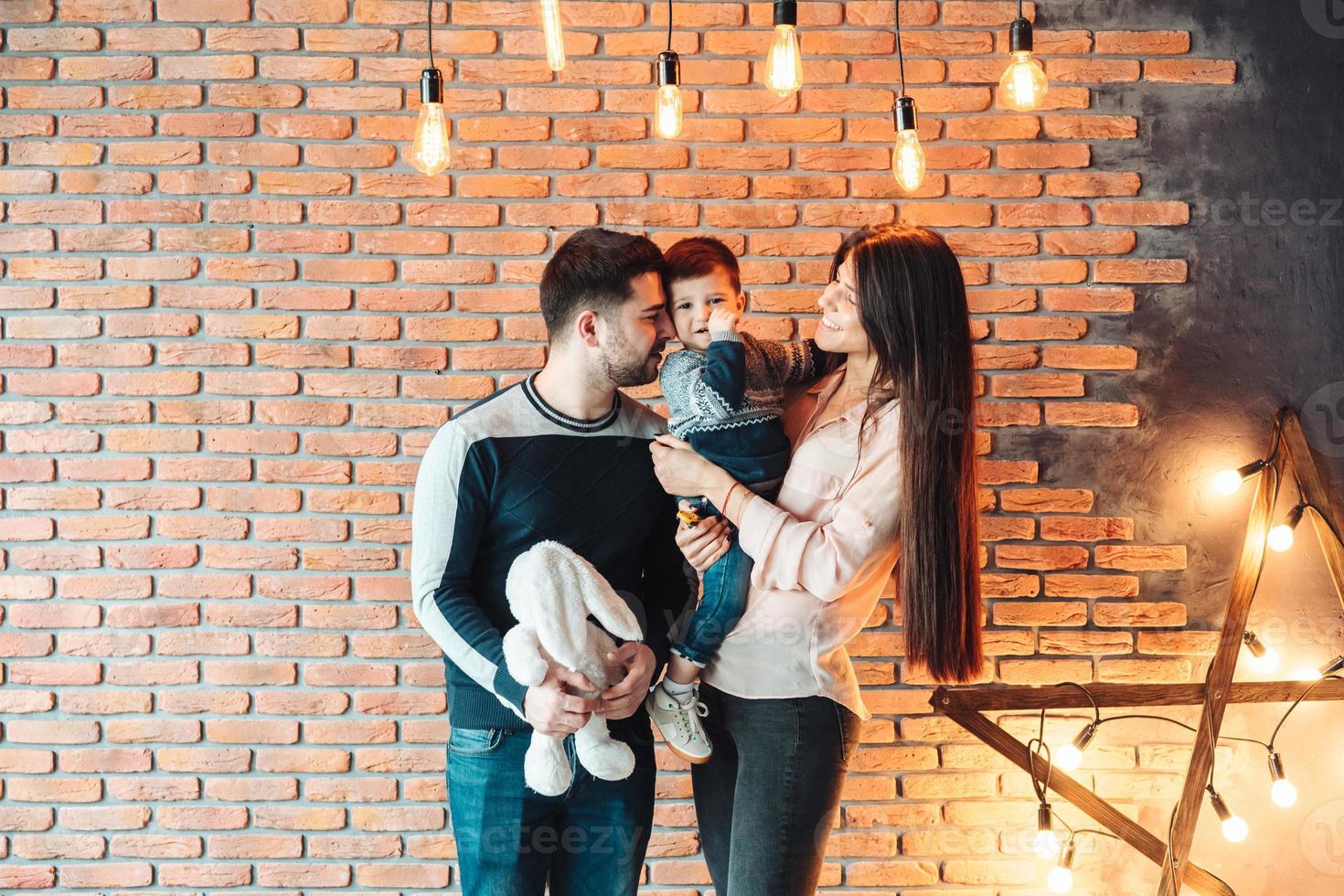 young family having fun at home photo